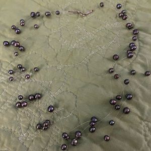 Floating pearl choker necklace